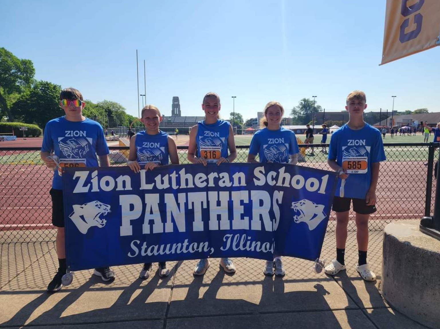 a child is drawing on a piece of paper