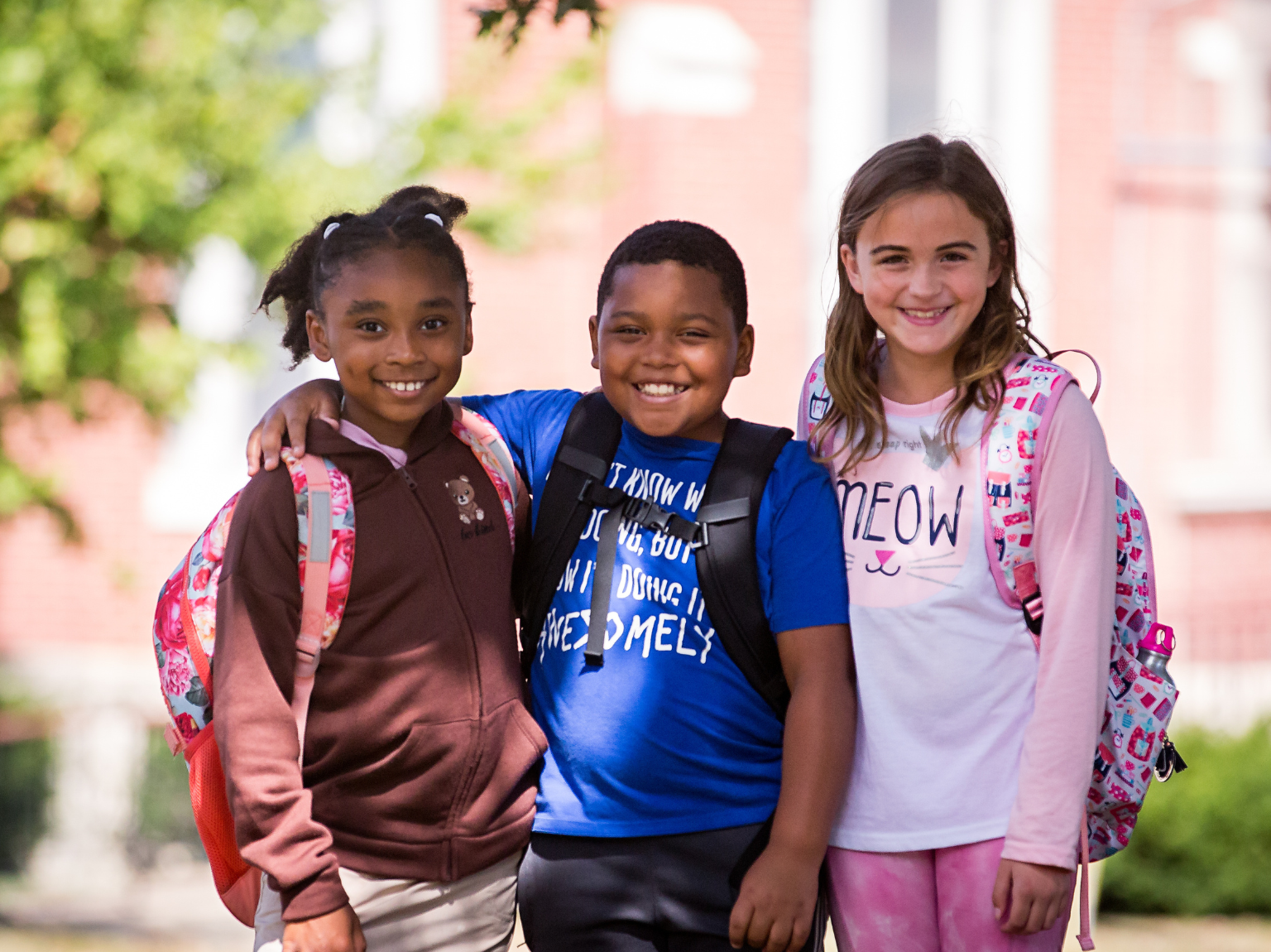 a child is drawing on a piece of paper